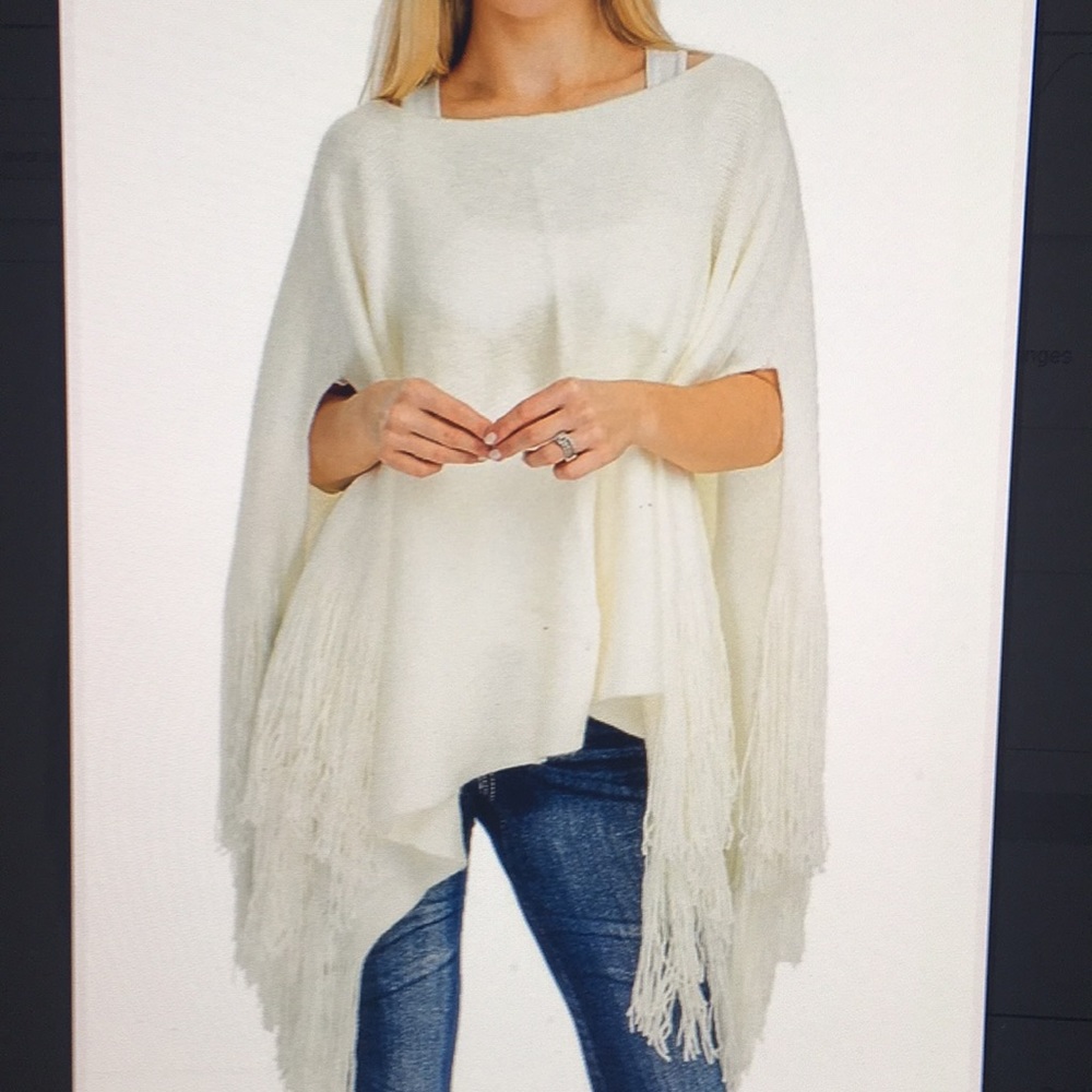 Ladies soft poncho with fringe.   Women’s poncho
